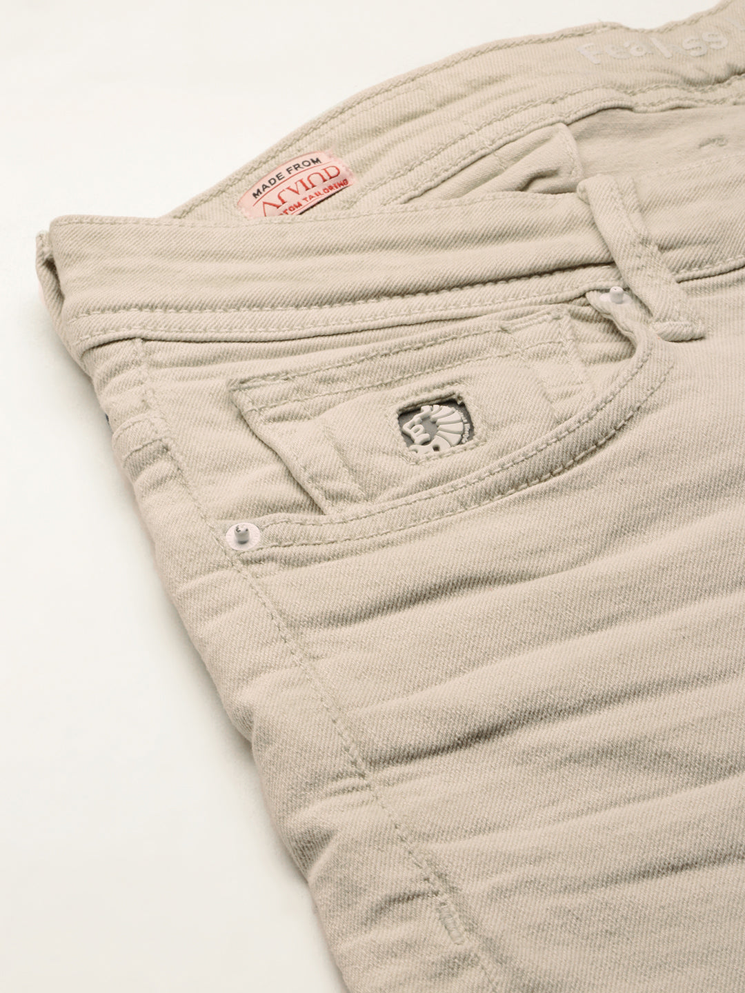 Off White Low Rise Slim Stretchable Jeans